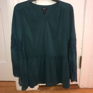 Women’s green blouse with lace